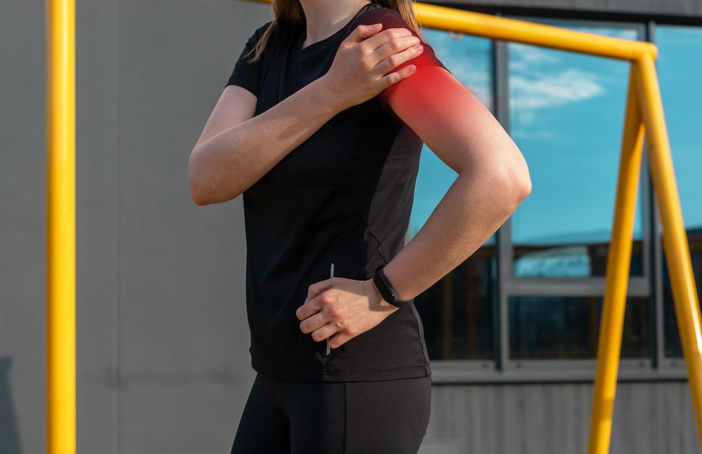 athlete-touching-painful-shoulder-with-red-point-during-outdoor-training-dislocation-arthritis-fracture-rotator-cuff-strain-consequences-health-problems-sport-concept.jpg