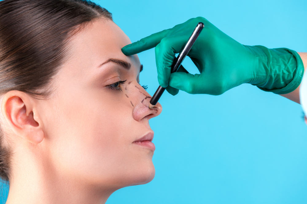 cosmetic-surgeon-examining-female-client-office-doctor-draws-lines-with-marker-eyelid-before-plastic-surgery-blepharoplasty-surgeon-beautician-hands-touching-woman-face-rhinoplasty.jpg