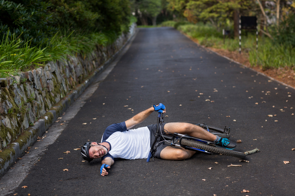 male-cyclist-fallen-from-his-mountain-bike.jpg