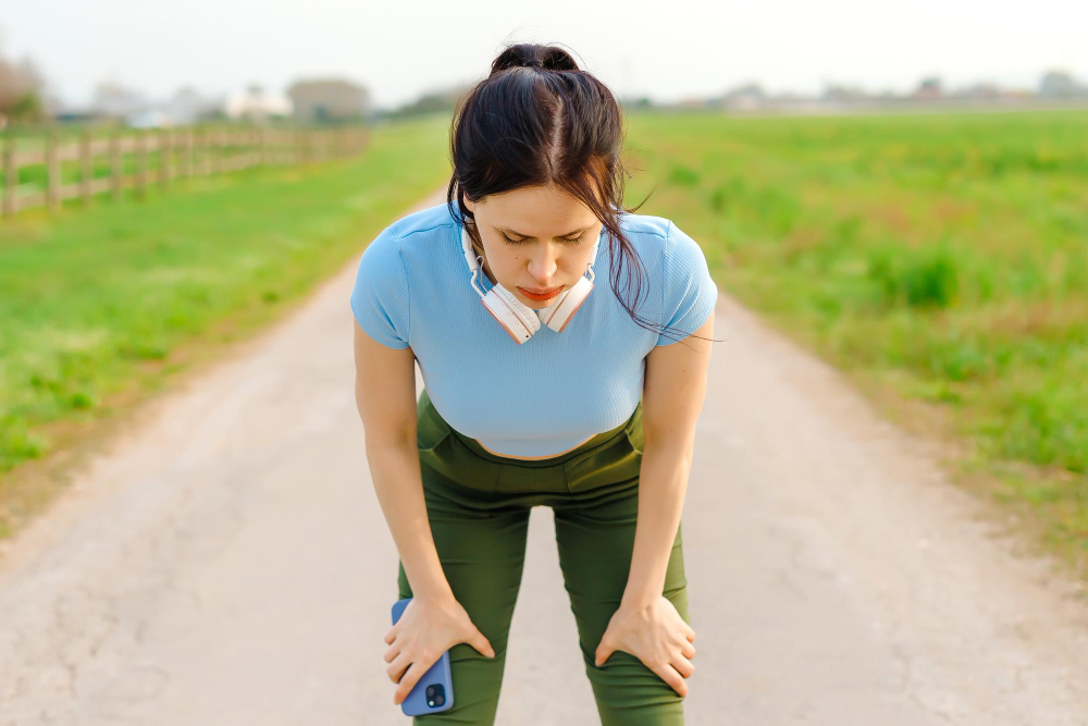 women-feeling-tired-during-her-outdoor-workout.jpg