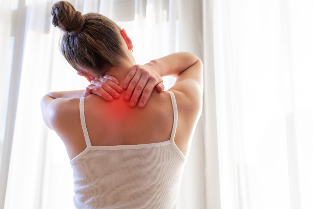 young-woman-massaging-her-neck-because-suffering-from-pain-neck-stretching-muscles.jpg